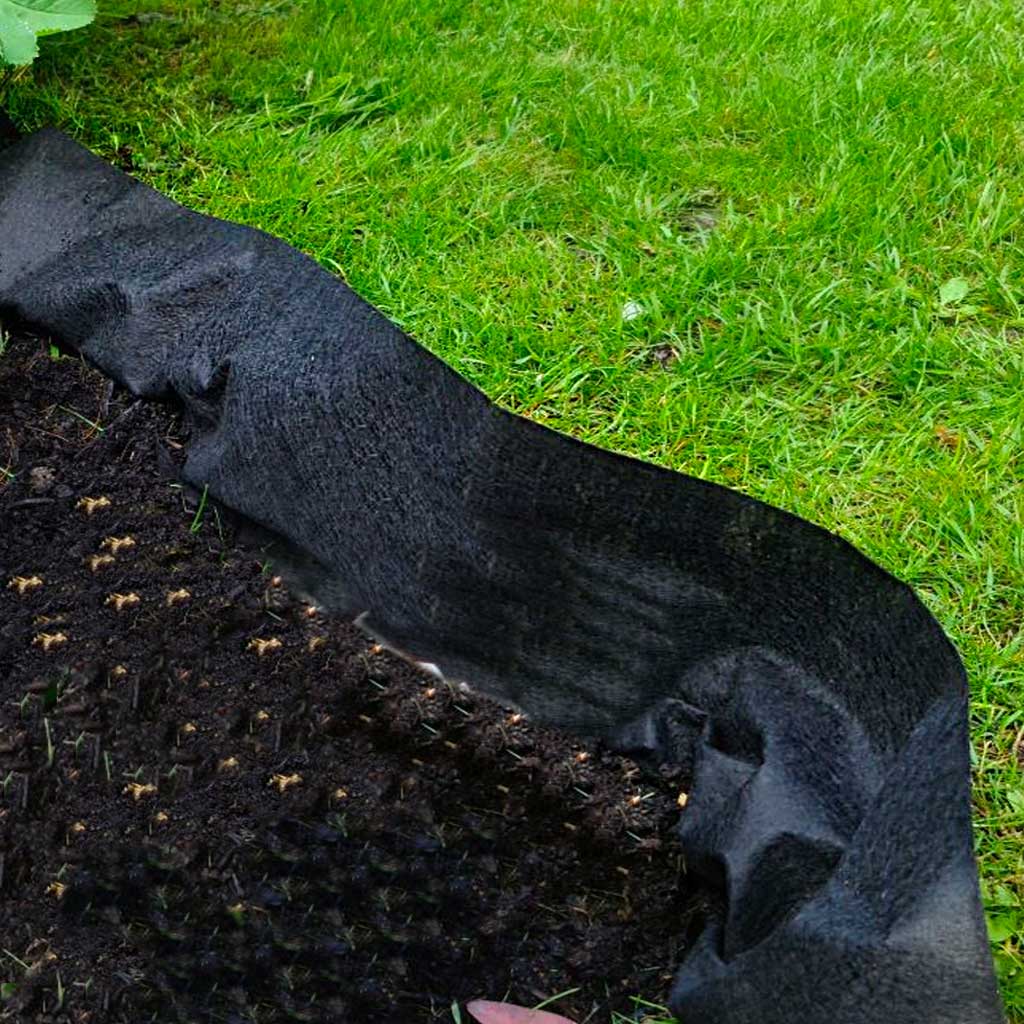 weed membrane on grass